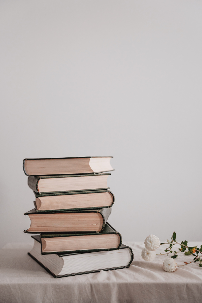 Aesthetic book stack background, reading and education